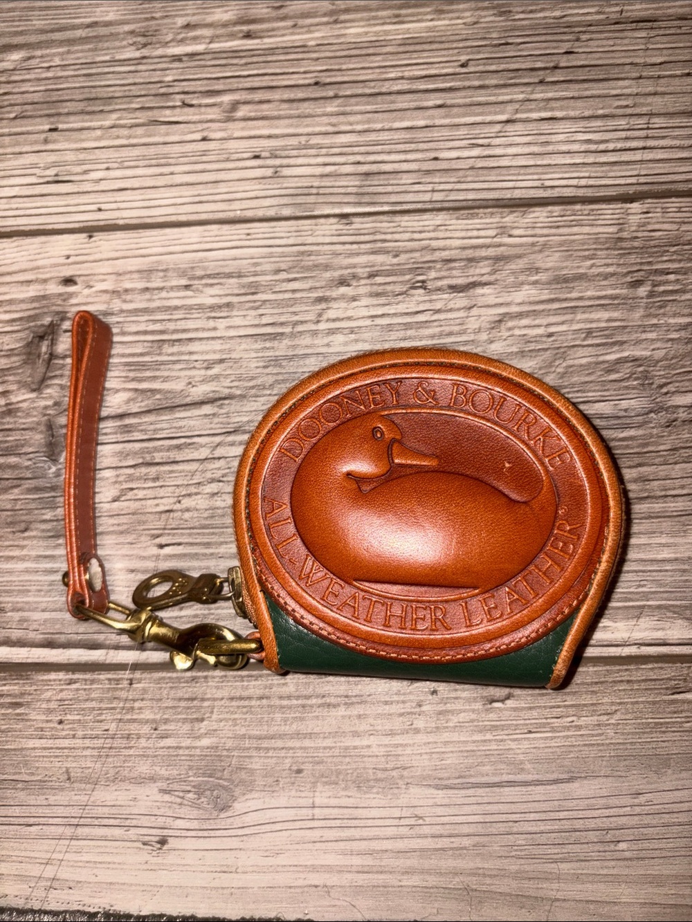 Dooney & Bourke Brown and Green Leather Coin Wristlet with Logo Medallion